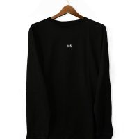 black long sleeve shirt on white table